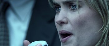 Movie still from “Phone Booth” (2002), directed by Joel Schumacher – A person holding a game controller; Extreme Close Up shot, Low angle