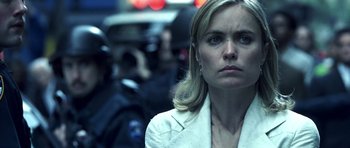 Movie still from “Phone Booth” (2002), directed by Joel Schumacher – A person wearing a white jacket; Close Up shot, Low angle