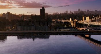 Movie still from “The Crow” (1994), directed by Alex Proyas – A view of a city skyline at sunset; Extreme Wide shot, High angle