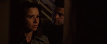 Movie still from “The Curse of La Llorona” (2019), directed by Michael Chaves – A man and a woman sitting next to each other; Close Up shot, Over the shoulder angle