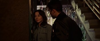 Movie still from “The Curse of La Llorona” (2019), directed by Michael Chaves – A man and a woman standing next to each other; Medium shot, Over the shoulder angle