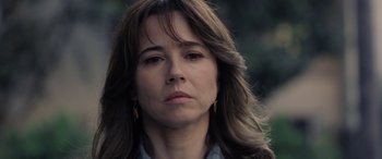 Movie still from “The Curse of La Llorona” (2019), directed by Michael Chaves – A person with long brown hair; Close Up shot, Over the shoulder angle