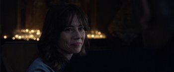 Movie still from “The Curse of La Llorona” (2019), directed by Michael Chaves – A person sitting in front of a laptop; Close Up shot, Over the shoulder angle