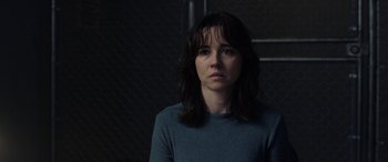 Movie still from “The Curse of La Llorona” (2019), directed by Michael Chaves – A woman in a blue shirt is looking at the camera; Close Up shot, Over the shoulder angle