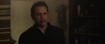 Movie still from “The Curse of La Llorona” (2019), directed by Michael Chaves – A person wearing a black shirt; Close Up shot, Over the shoulder angle