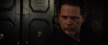 Movie still from “The Curse of La Llorona” (2019), directed by Michael Chaves – A person wearing a black shirt; Close Up shot, Over the shoulder angle