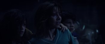 Movie still from “The Curse of La Llorona” (2019), directed by Michael Chaves – A woman and a child in a dark room; Close Up shot, Low angle