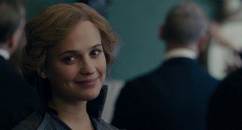 Movie still from “The Danish Girl” (2015), directed by Tom Hooper – A person with a tie; Close Up shot, Over the shoulder angle