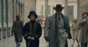 Movie still from “The Danish Girl” (2015), directed by Tom Hooper – A man and a woman walking down a street; Medium shot, Low angle