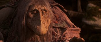 Movie still from “The Dark Crystal” (1982), directed by Frank Oz – View of the face of an animal; Close Up shot, Low angle