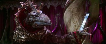 Movie still from “The Dark Crystal” (1982), directed by Frank Oz – The head of a creature; Close Up shot, High angle
