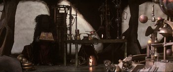 Movie still from “The Dark Crystal” (1982), directed by Frank Oz – A room filled with lots and lots of stuff; Wide shot, High angle