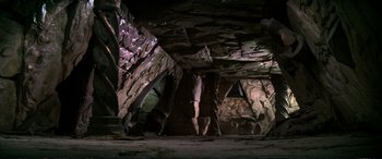 Movie still from “The Dark Crystal” (1982), directed by Frank Oz – A room with a lot of rocks on the floor; Extreme Wide shot, High angle