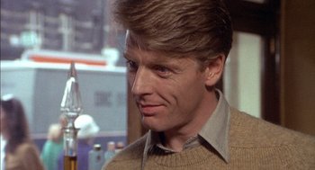 Movie still from “The Day of the Jackal” (1973), directed by Fred Zinnemann – A person wearing a sweater; Close Up shot, Low angle