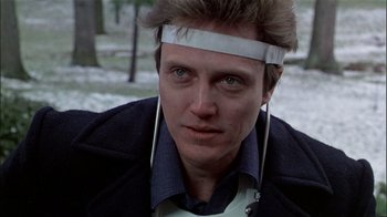 Movie still from “The Dead Zone” (1983), directed by David Cronenberg – A person wearing a headband; Close Up shot, Low angle
