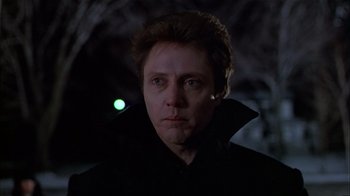 Movie still from “The Dead Zone” (1983), directed by David Cronenberg – A person wearing a black jacket; Close Up shot, Low angle