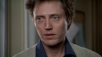 Movie still from “The Dead Zone” (1983), directed by David Cronenberg – A person wearing a shirt and jacket; Close Up shot, Low angle