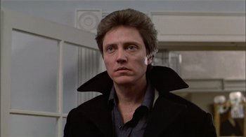 Movie still from “The Dead Zone” (1983), directed by David Cronenberg – A person wearing a jacket; Close Up shot, Low angle