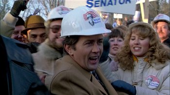 Movie still from “The Dead Zone” (1983), directed by David Cronenberg – A group of people wearing hats and hats; Close Up shot, High angle