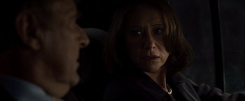 Movie still from “The Debt” (2010), directed by John Madden – A woman in a black shirt and a man in a black shirt; Close Up shot, Over the shoulder angle