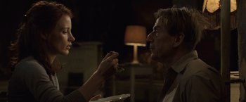 Movie still from “The Debt” (2010), directed by John Madden – A man and a woman talking to each other; Close Up shot, Over the shoulder angle