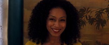 Movie still from “The Devil's Advocate” (1997), directed by Taylor Hackford – A person with curly black hair; Close Up shot, Low angle