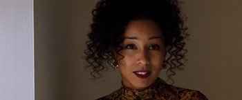 Movie still from “The Devil's Advocate” (1997), directed by Taylor Hackford – A person wearing a dress; Close Up shot, Low angle