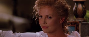 Movie still from “The Devil's Advocate” (1997), directed by Taylor Hackford – A person wearing a white shirt; Close Up shot, Over the shoulder angle