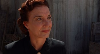 Movie still from “The Devil's Backbone” (2001), directed by Guillermo del Toro – A person wearing a black shirt; Close Up shot, Low angle