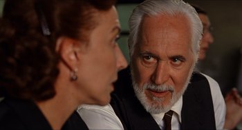 Movie still from “The Devil's Backbone” (2001), directed by Guillermo del Toro – An older man and a younger woman looking at each other; Close Up shot, Over the shoulder angle