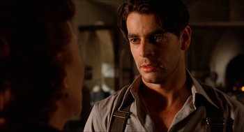 Movie still from “The Devil's Backbone” (2001), directed by Guillermo del Toro – A man and a woman are talking to each other; Close Up shot, Over the shoulder angle