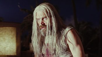 Movie still from “The Devil's Rejects” (2005), directed by Rob Zombie – A man with long white hair and a long beard; Close Up shot, Low angle