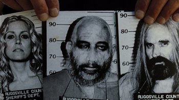 Movie still from “The Devil's Rejects” (2005), directed by Rob Zombie – A picture of a man in a jail cell; Extreme Close Up shot, Overhead angle