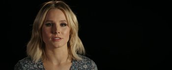 Movie still from “The Disaster Artist” (2017), directed by James Franco – A person with long blonde hair; Close Up shot, Over the shoulder angle