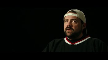 Movie still from “The Disaster Artist” (2017), directed by James Franco – A man wearing a hat and a black shirt; Close Up shot, Low angle