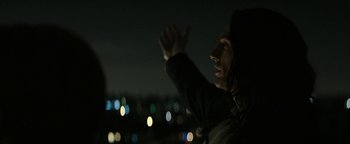 Movie still from “The Disaster Artist” (2017), directed by James Franco – A man with his hands up in the dark; Medium shot, Low angle
