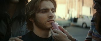 Movie still from “The Disaster Artist” (2017), directed by James Franco – A man with a beard is getting his hair brushed; Close Up shot, Over the shoulder angle