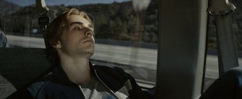 Movie still from “The Disaster Artist” (2017), directed by James Franco – A man sitting in a car looking out the window; Close Up shot, Low angle