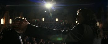 Movie still from “The Disaster Artist” (2017), directed by James Franco – A crowd of people sitting in front of an audience; Medium shot, Low angle