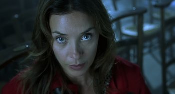 Movie still from “The Diving Bell and the Butterfly” (2007), directed by Julian Schnabel – A person with blue eyes; Close Up shot, Low angle
