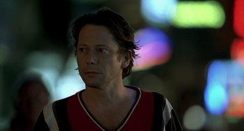 Movie still from “The Diving Bell and the Butterfly” (2007), directed by Julian Schnabel – A person with long hair; Close Up shot, Low angle