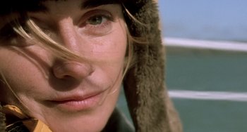 Movie still from “The Diving Bell and the Butterfly” (2007), directed by Julian Schnabel – A woman wearing a fur hat; Close Up shot, Over the shoulder angle