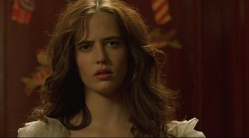 Movie still from “The Dreamers” (2003), directed by Bernardo Bertolucci – A person with long brown hair; Close Up shot, Over the shoulder angle