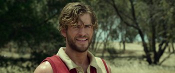 Movie still from “The Dressmaker” (2015), directed by Jocelyn Moorhouse – A person wearing a vest; Close Up shot, Over the shoulder angle