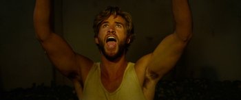 Movie still from “The Dressmaker” (2015), directed by Jocelyn Moorhouse – A person with his mouth wide open; Close Up shot, Low angle