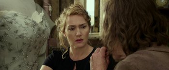 Movie still from “The Dressmaker” (2015), directed by Jocelyn Moorhouse – A person looking at a mirror; Close Up shot, Over the shoulder angle