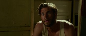 Movie still from “The Dressmaker” (2015), directed by Jocelyn Moorhouse – A person wearing a tank top; Close Up shot, Over the shoulder angle