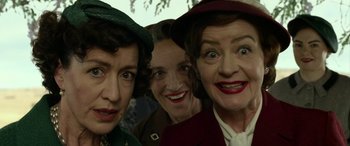 Movie still from “The Dressmaker” (2015), directed by Jocelyn Moorhouse – A group of women standing next to each other; Close Up shot, Low angle