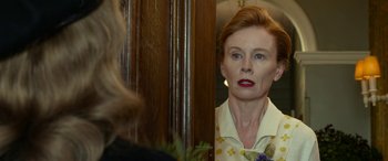 Movie still from “The Dressmaker” (2015), directed by Jocelyn Moorhouse – An older woman looking at herself in the mirror; Close Up shot, Over the shoulder angle