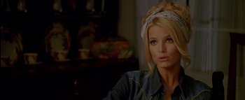 Movie still from “The Dukes of Hazzard” (2005), directed by Jay Chandrasekhar – A woman with a bandana on her head; Close Up shot, Over the shoulder angle